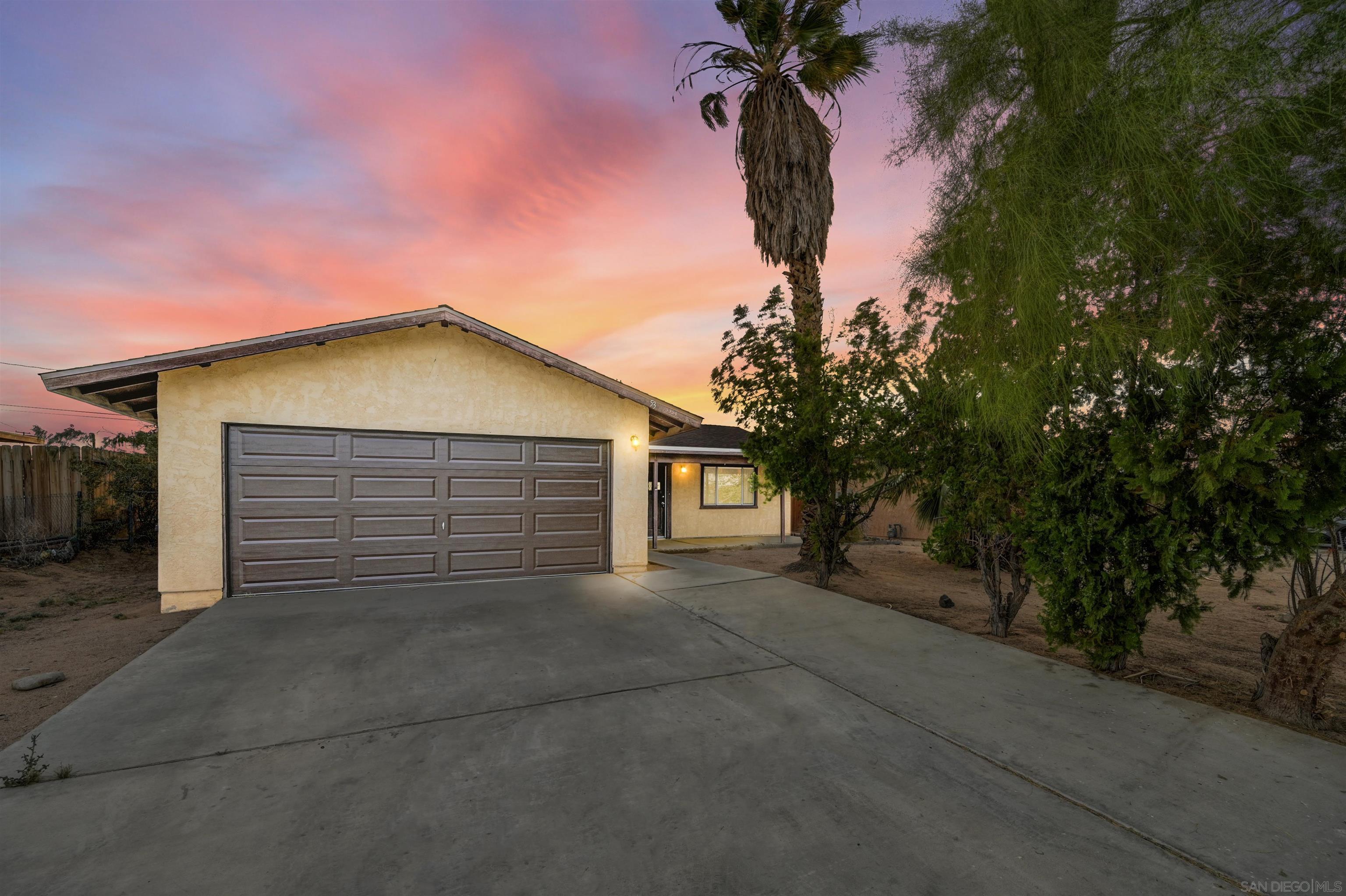 front view of a house with a garage