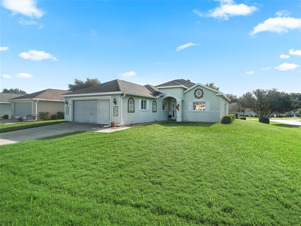 a view of a house with a big yard