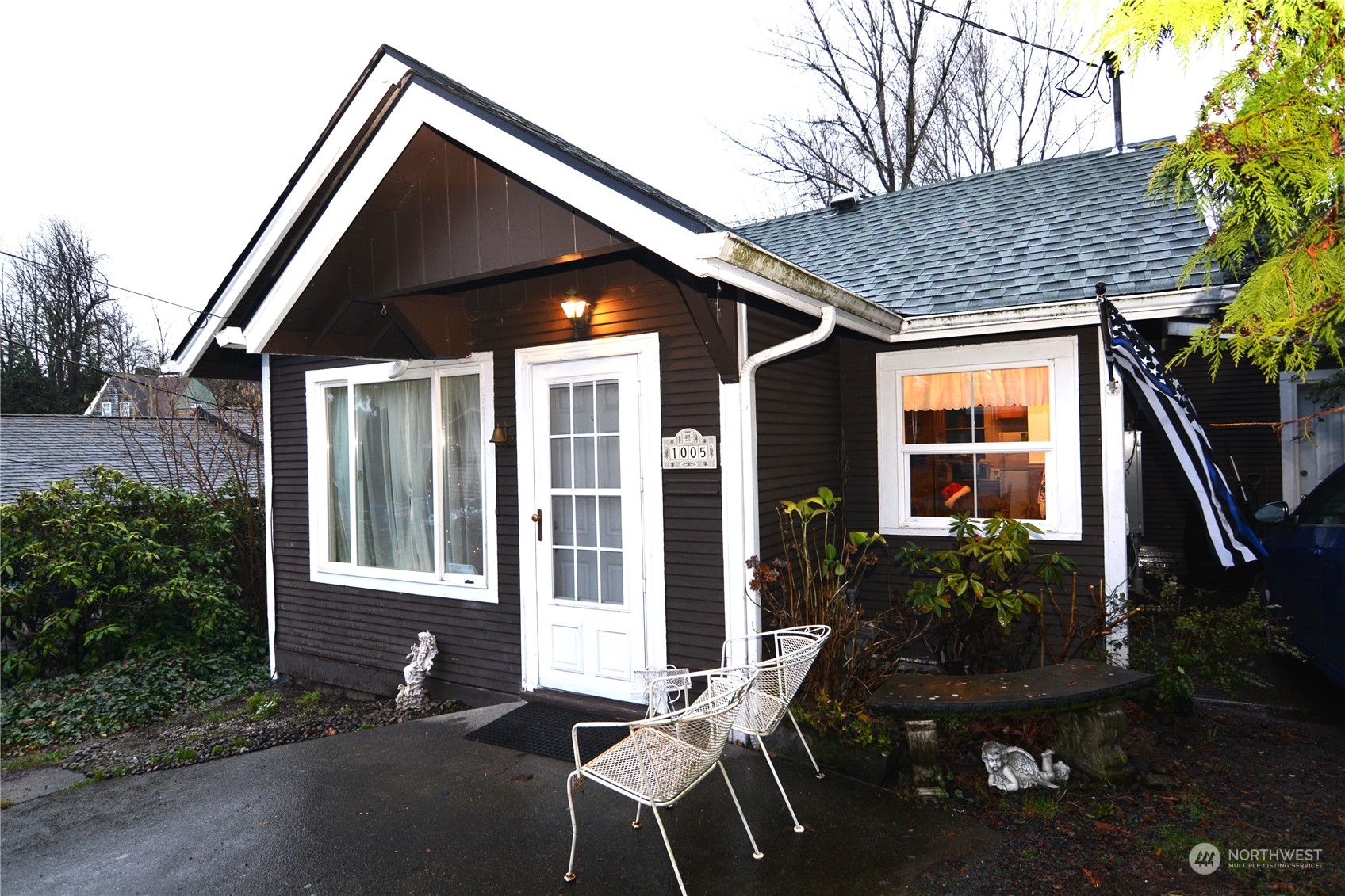 a front view of a house with garden