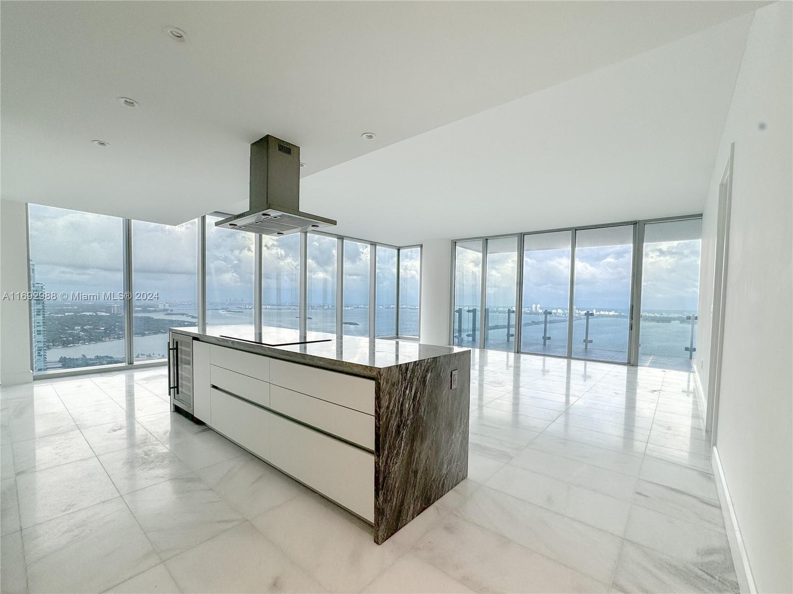 a spacious bathroom with a large tub and shower