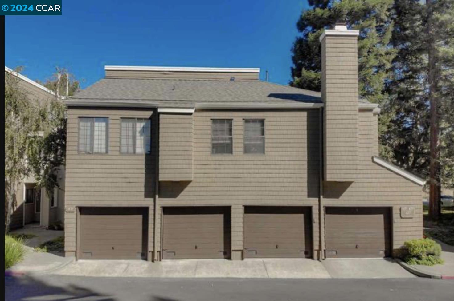 a view of a house with a garage