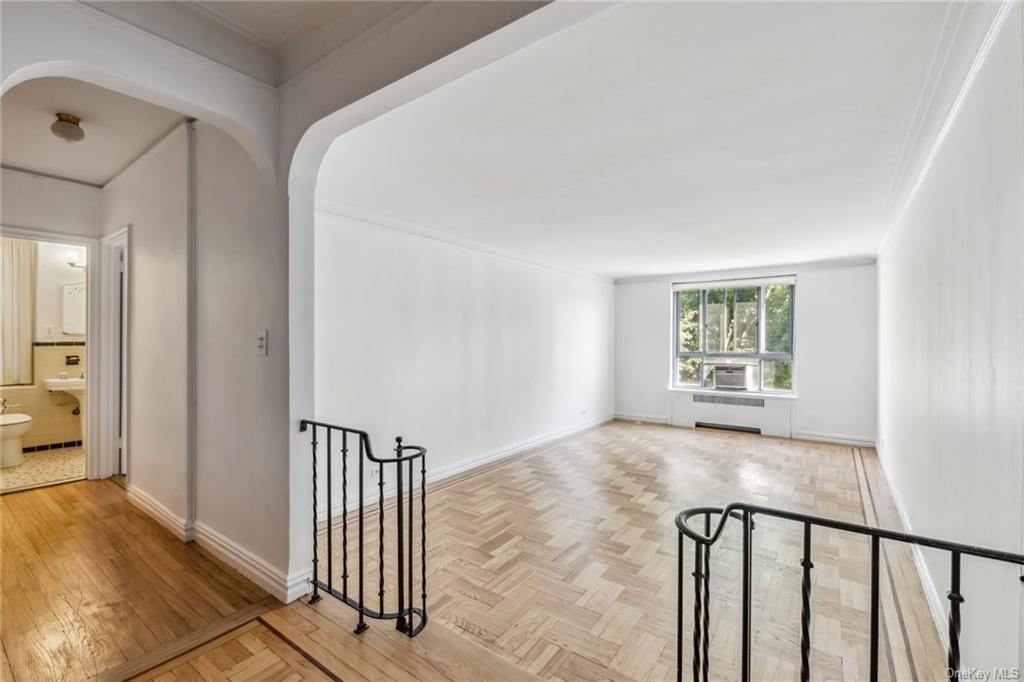 a view of a hallway with a bedroom