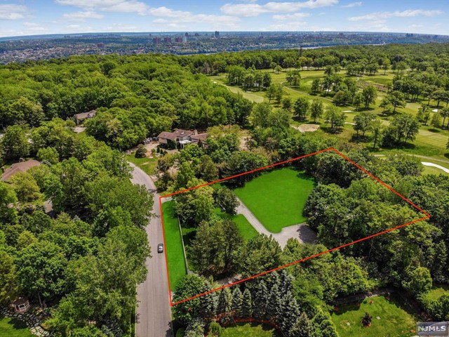 an aerial view of a garden with a yard