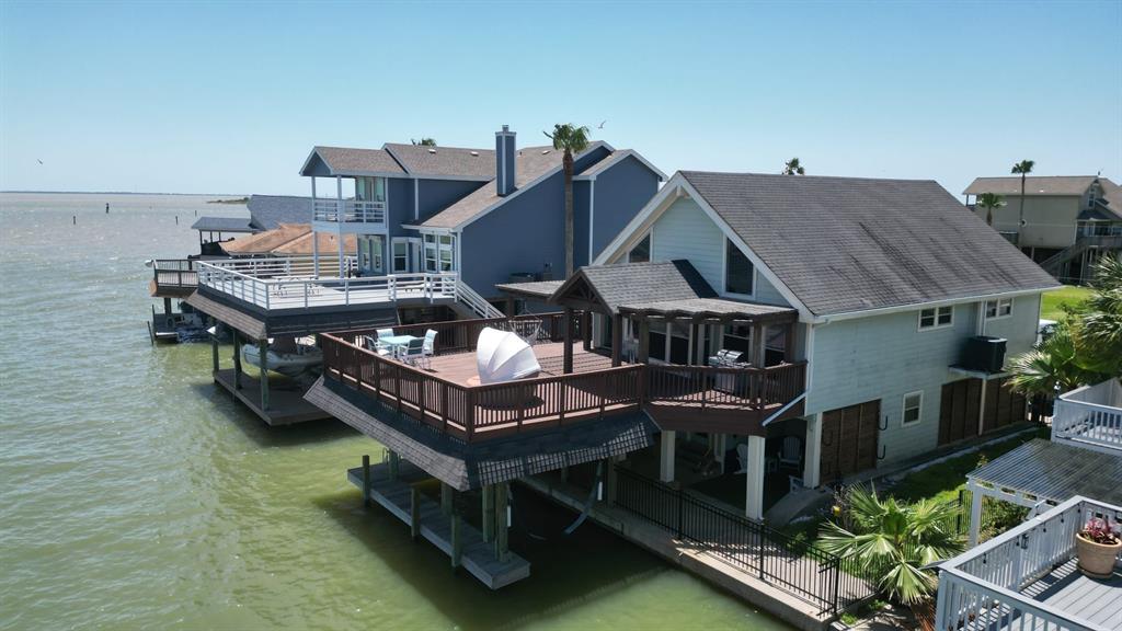 a roof view of a house with roof deck outdoor seating