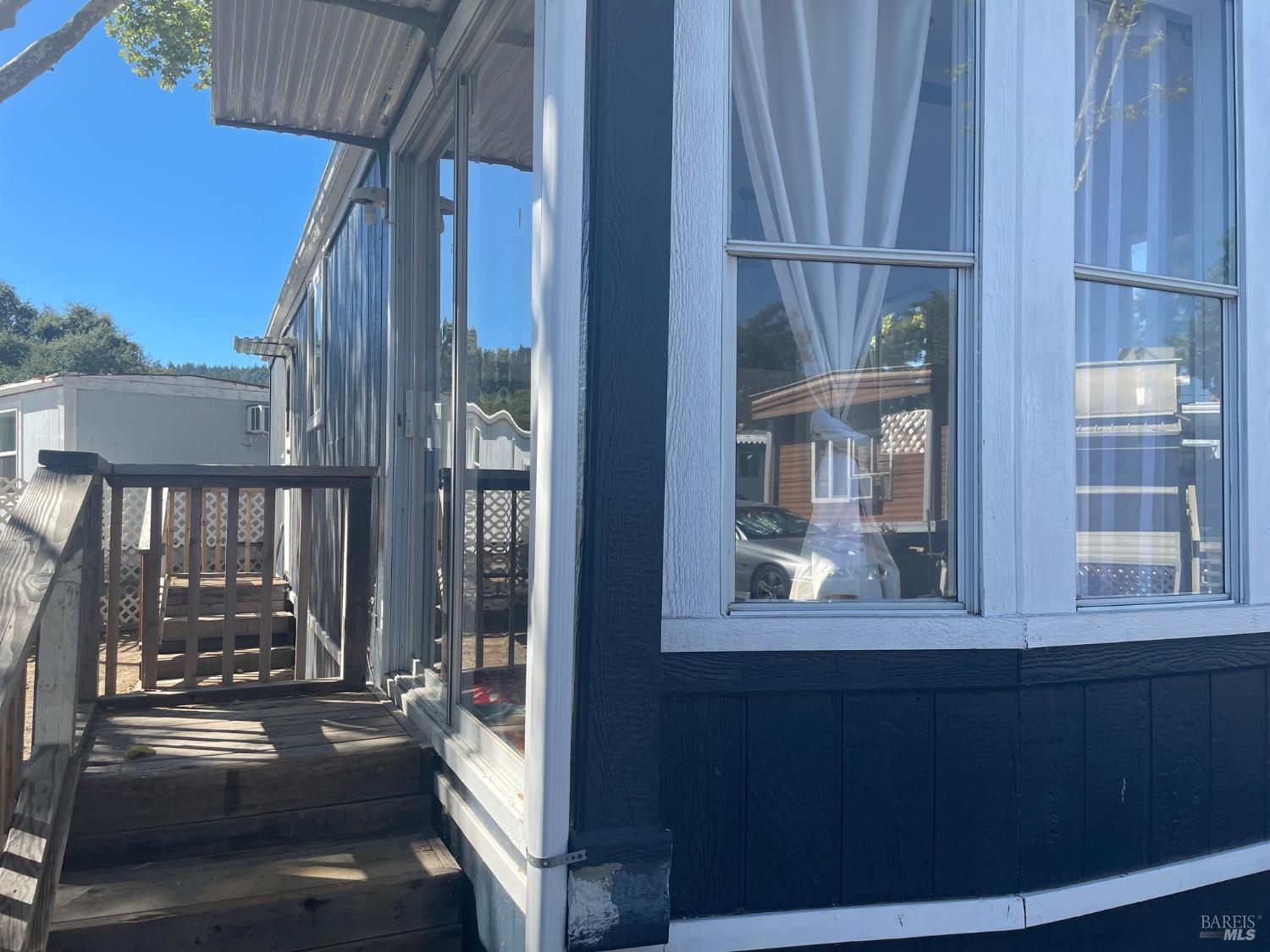 a view of a balcony with an outdoor space