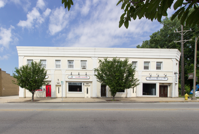 a view of a building with a street