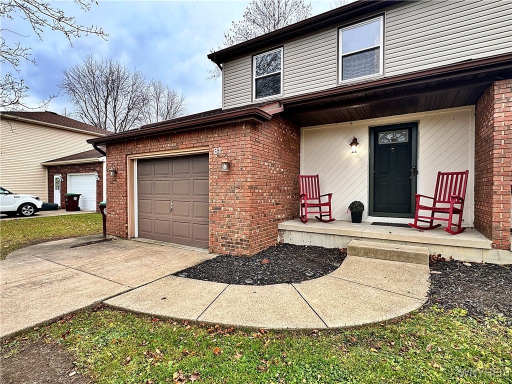 Private entry with attached garage