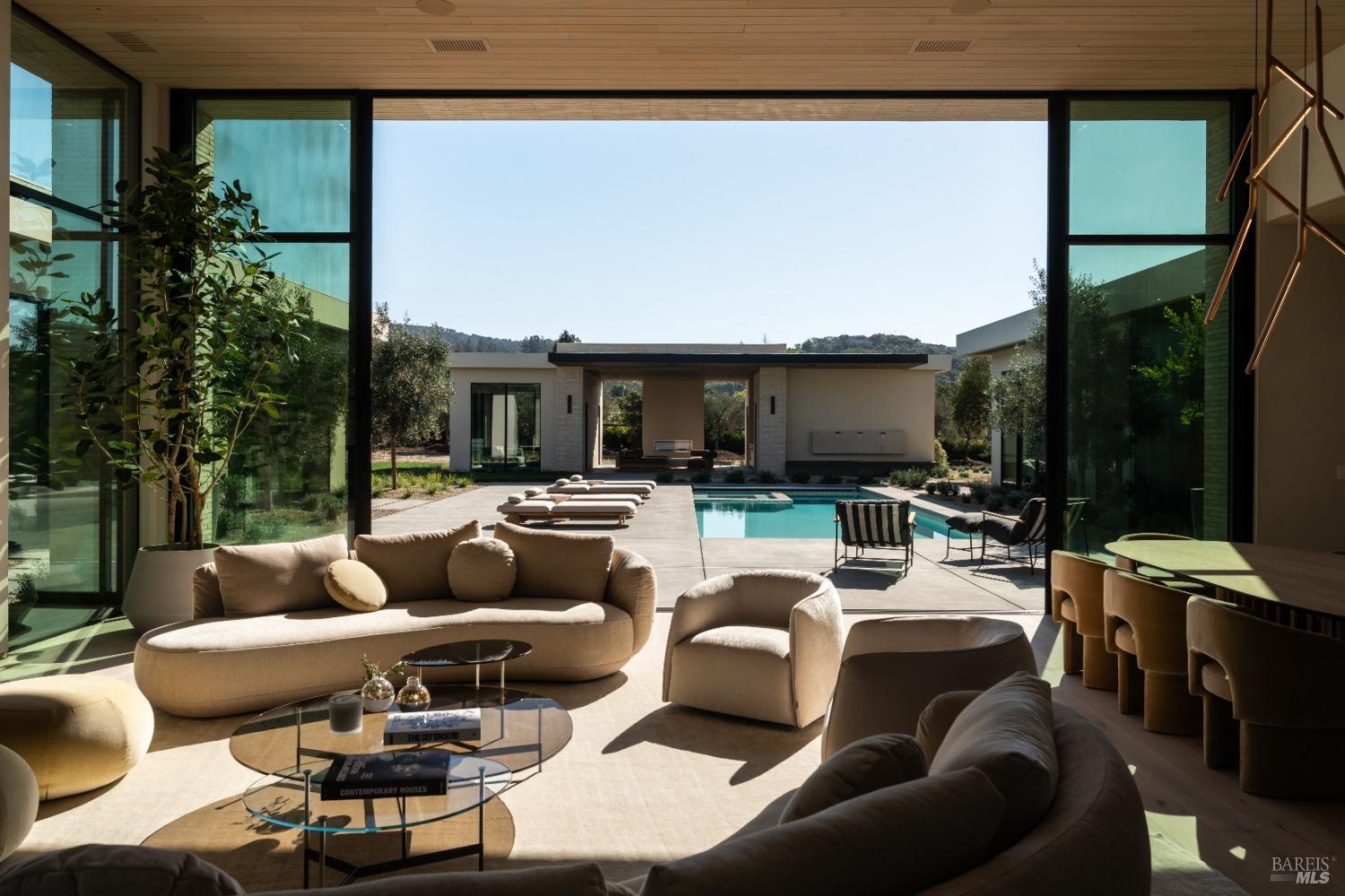 a outdoor space with patio couch and a potted plant