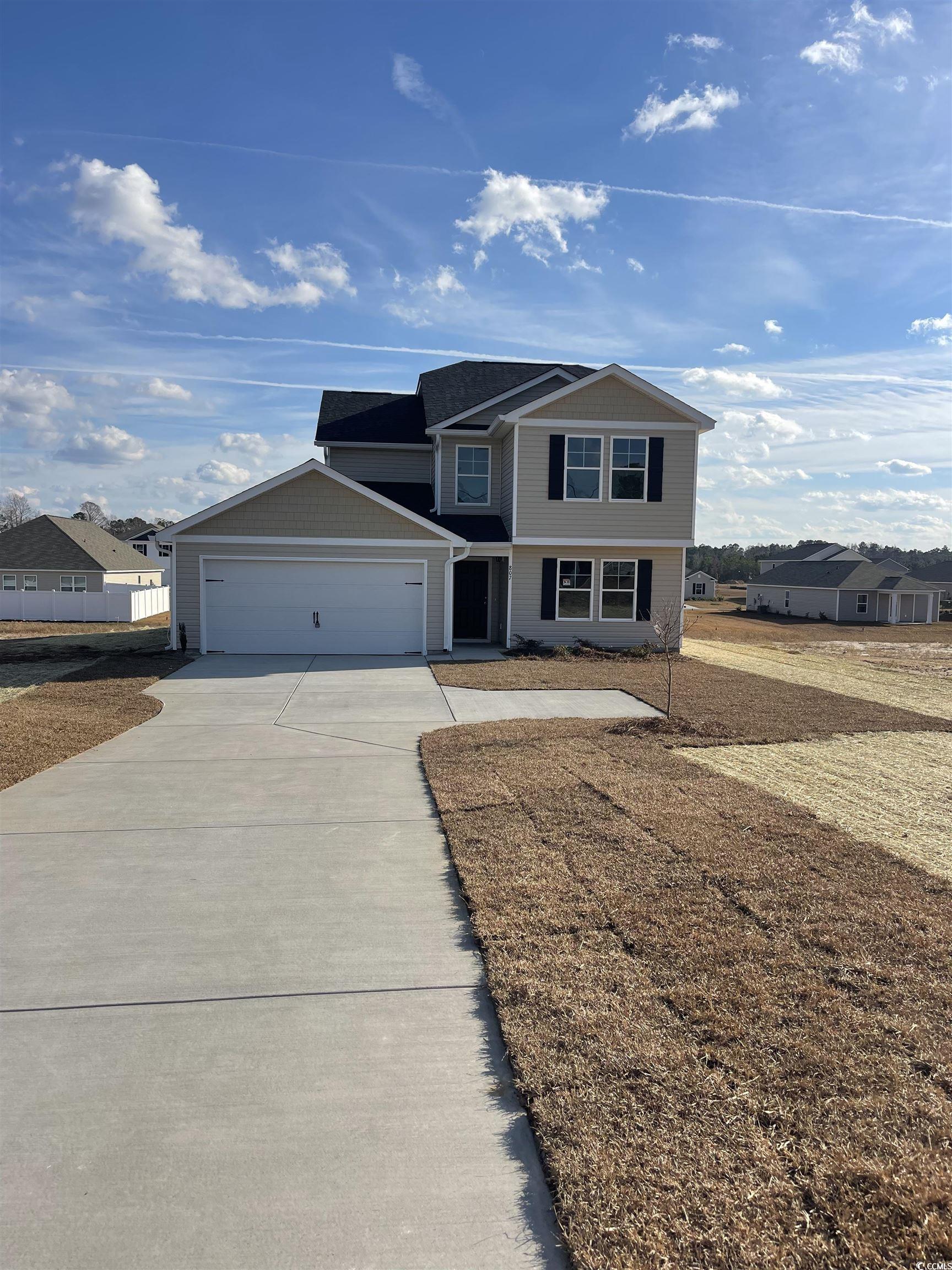 View of front of home with a garage