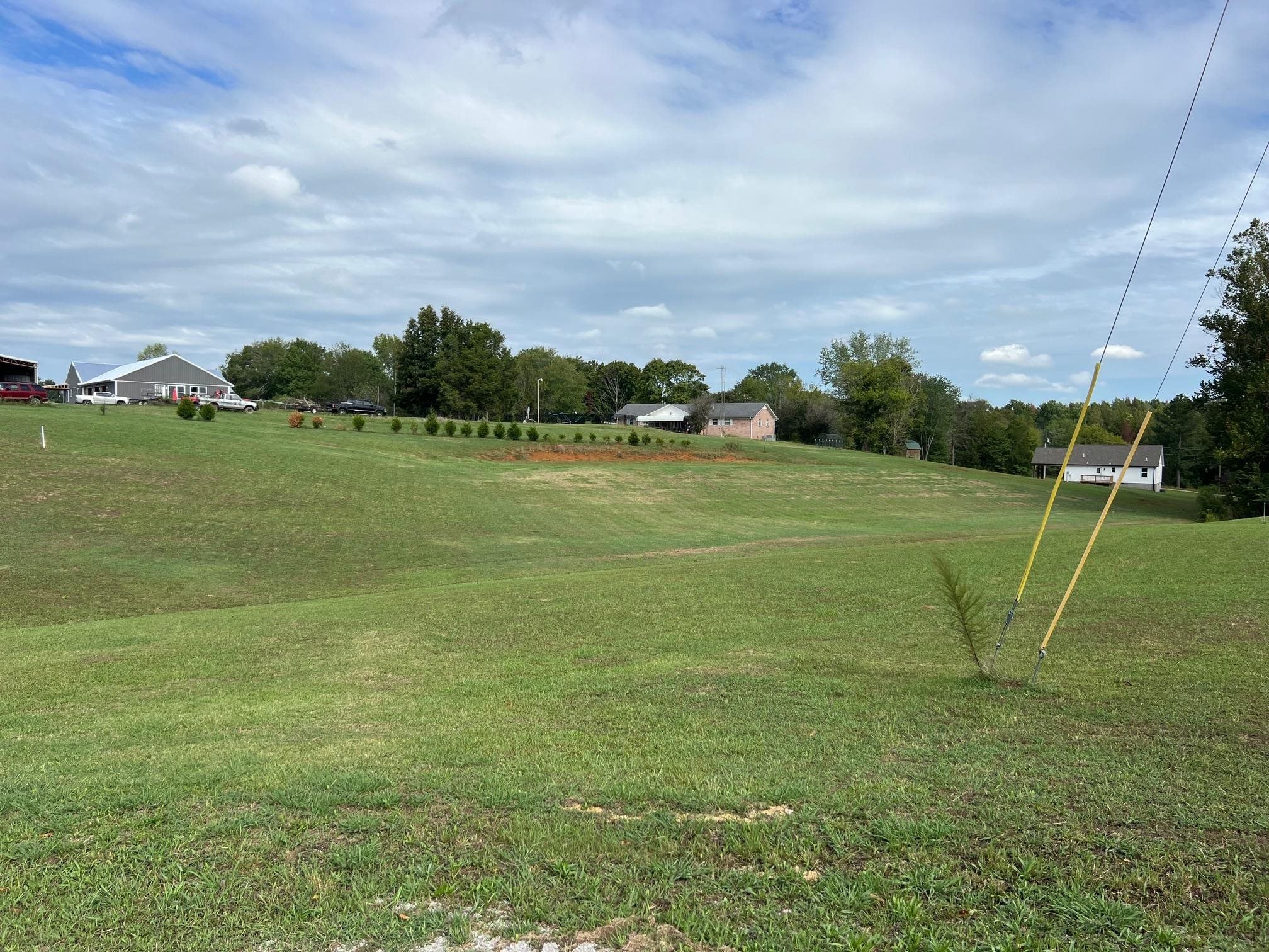 a view of an outdoor space and tennis court