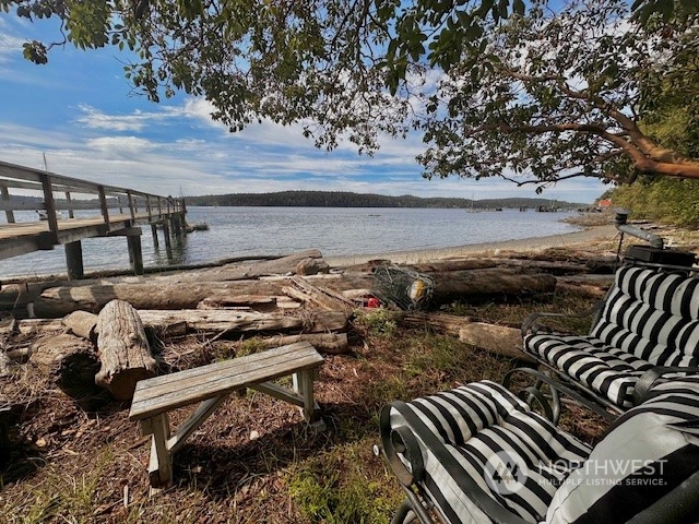 a view of a patio near an ocean