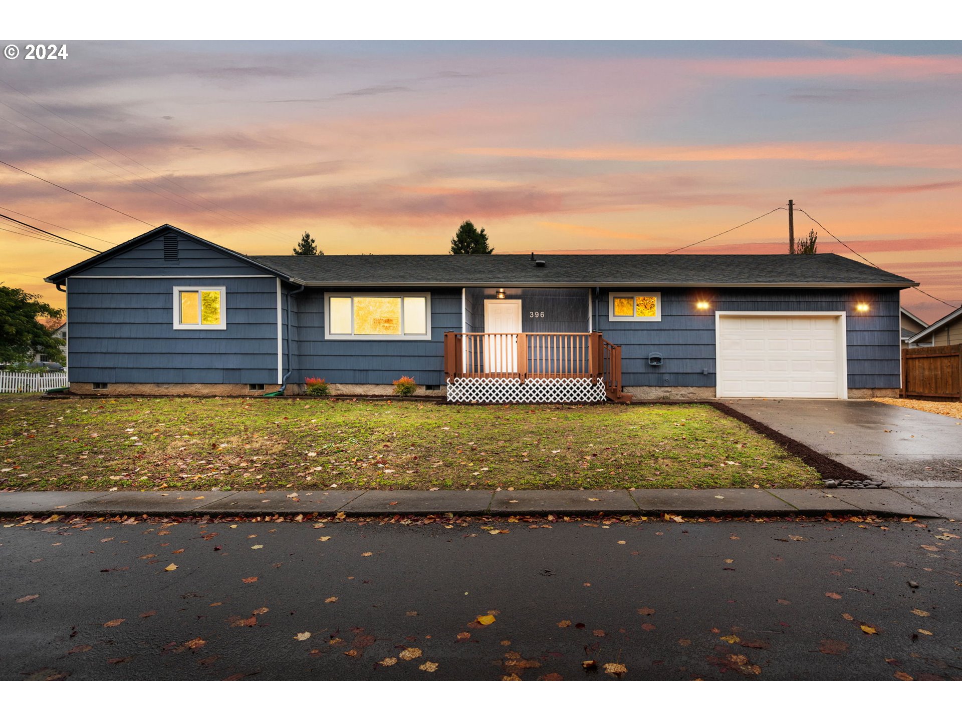 a view of a house with a yard