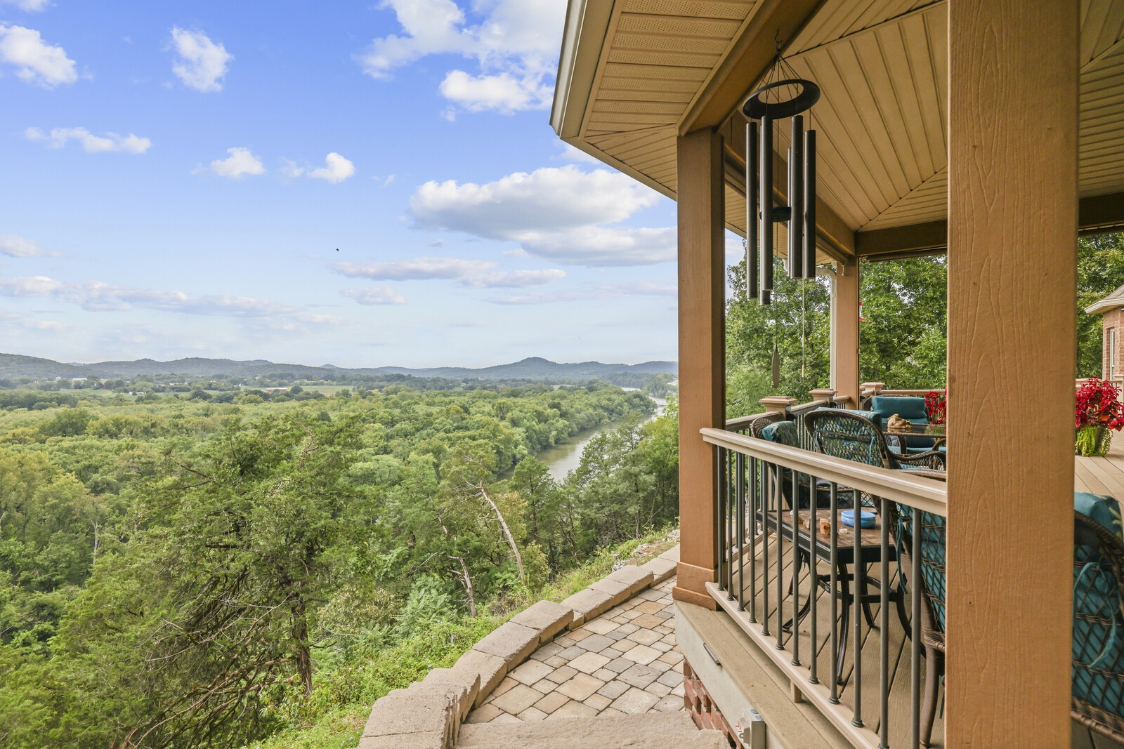 a view of a balcony with an ocean view