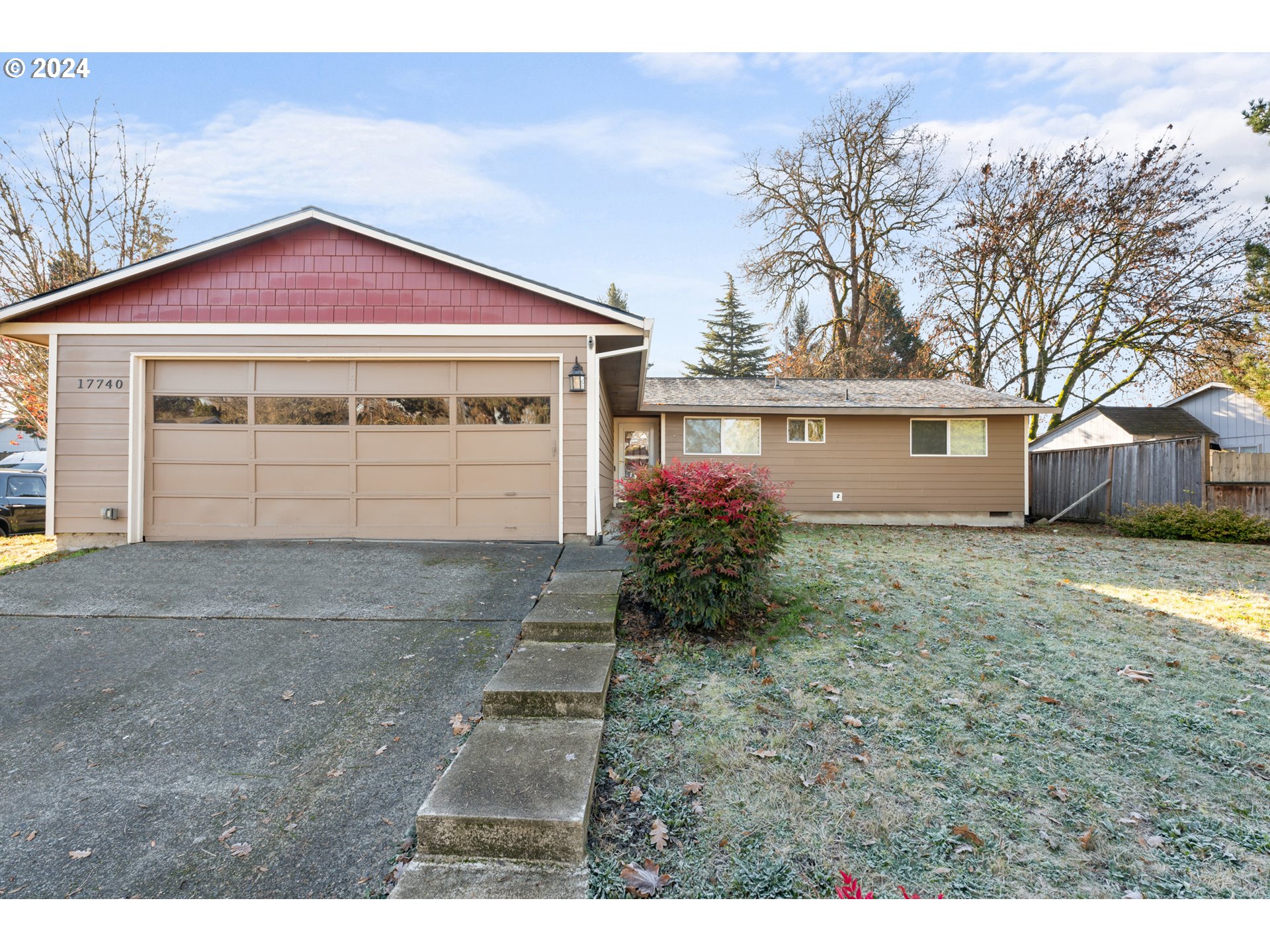 a view of front of house with a yard