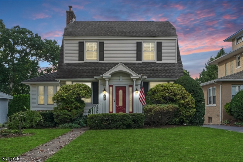 a front view of house with a yard