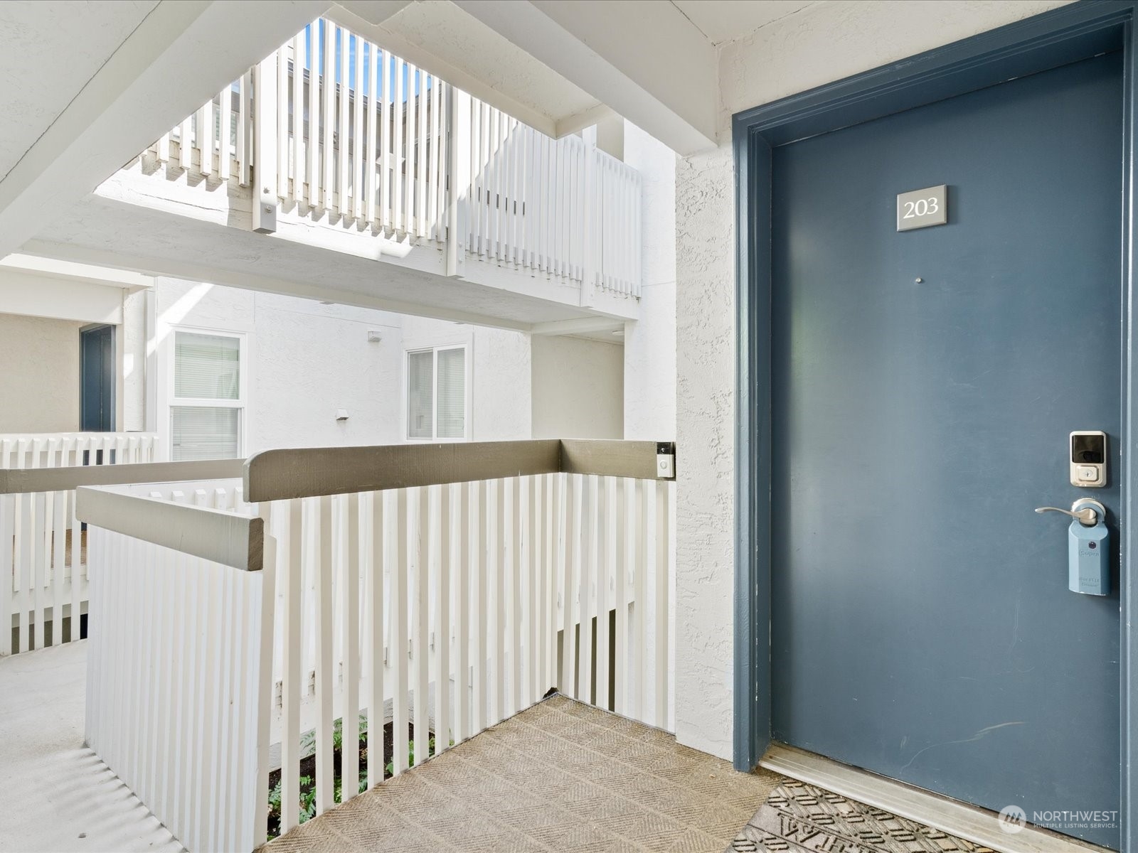 a view of entryway with a front door