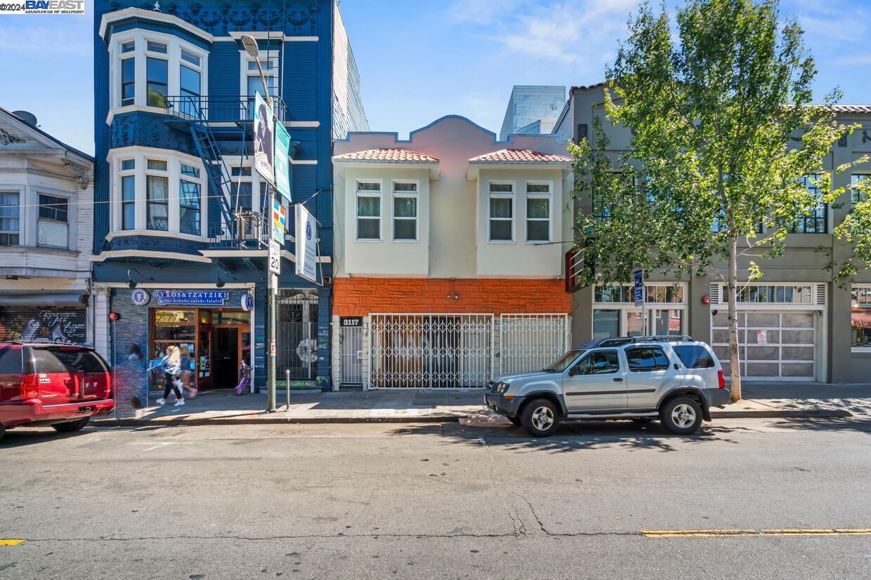 a car parked in front of a building