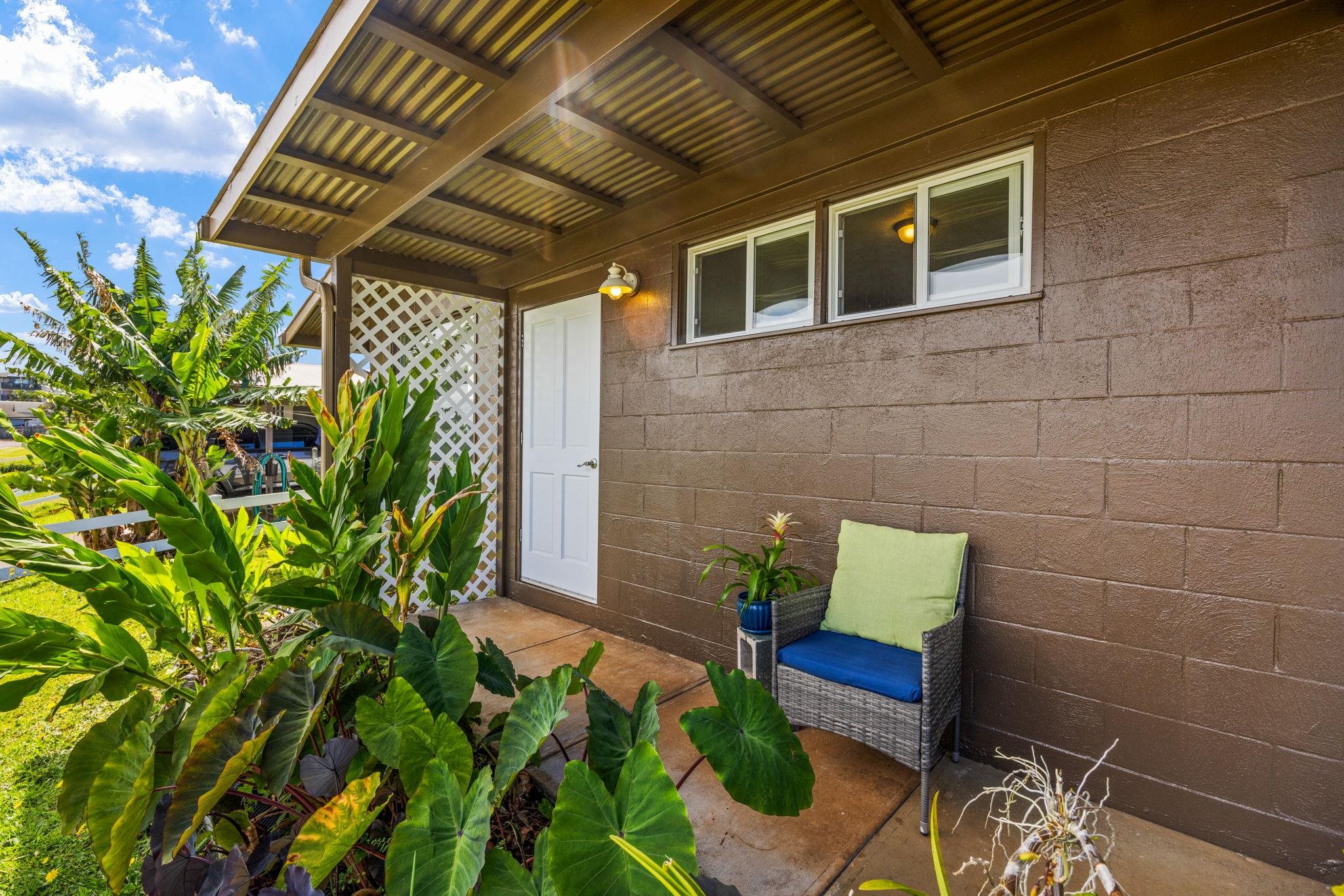 a house with a table and chairs in patio