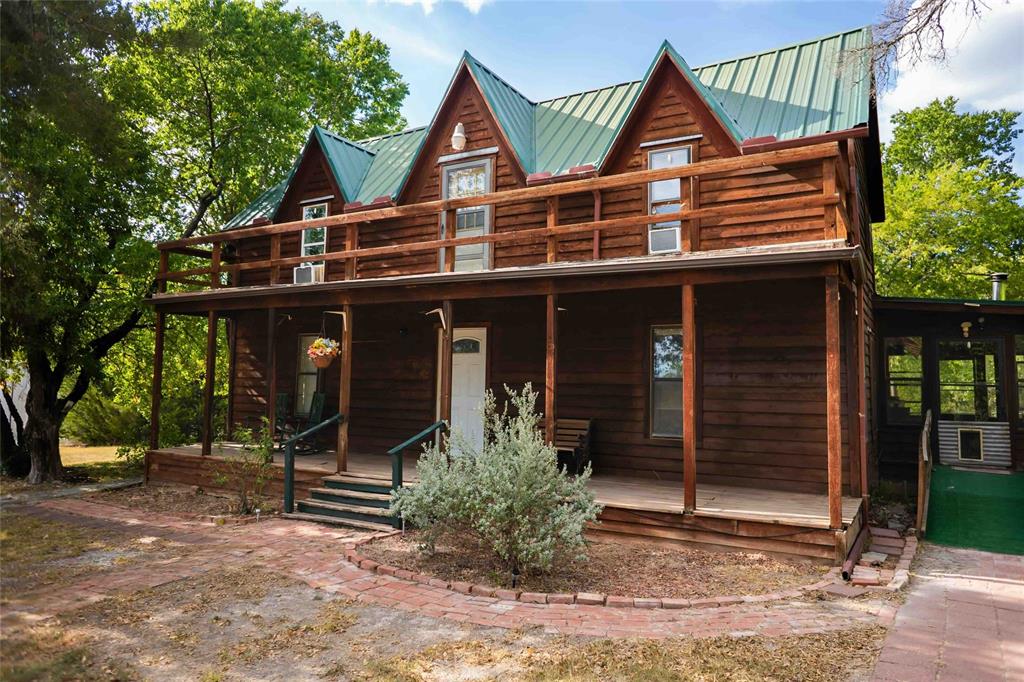 a view of house with a outdoor space