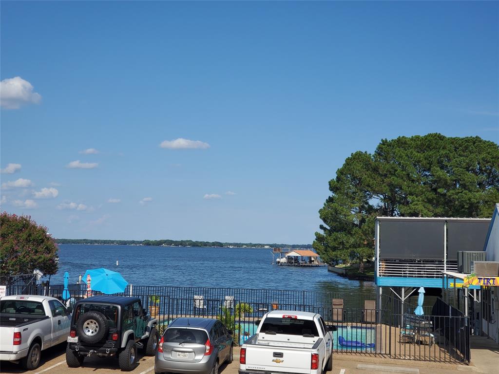 a view of parking with cars parked