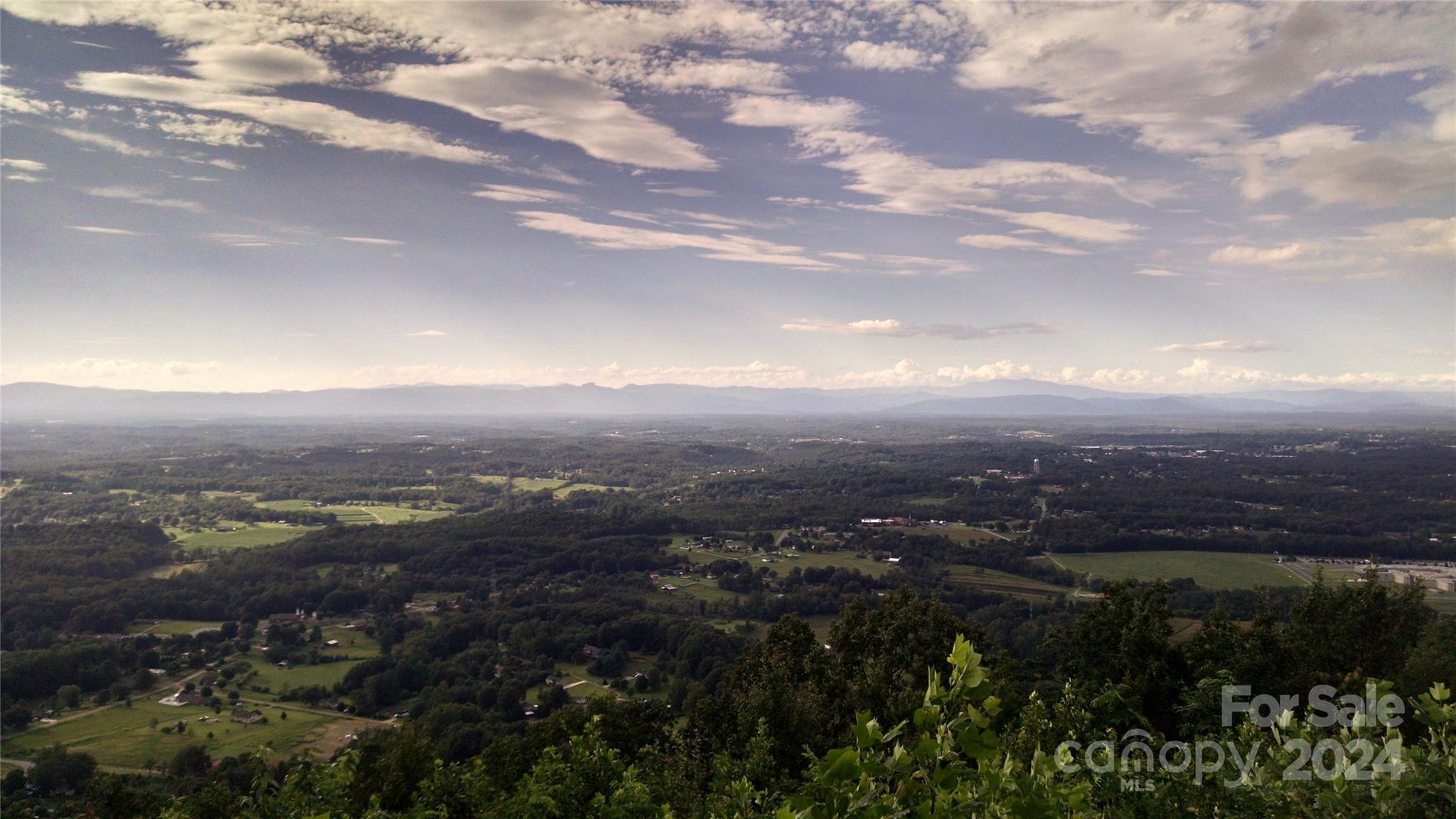 wooden view of city and mountain