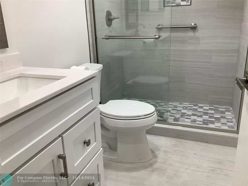 a bathroom with a sink and a toilet