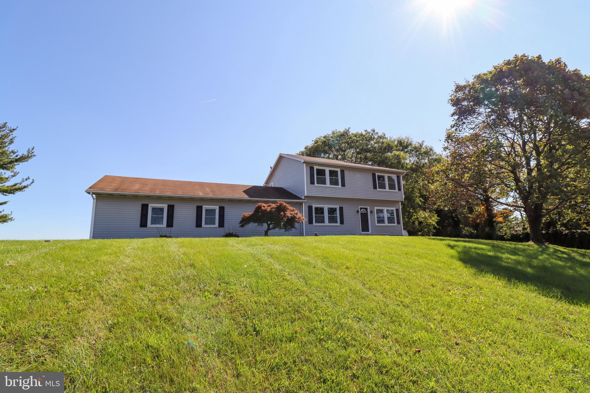 a house view with a garden space