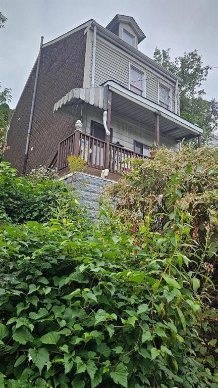 front view of a house with a small yard