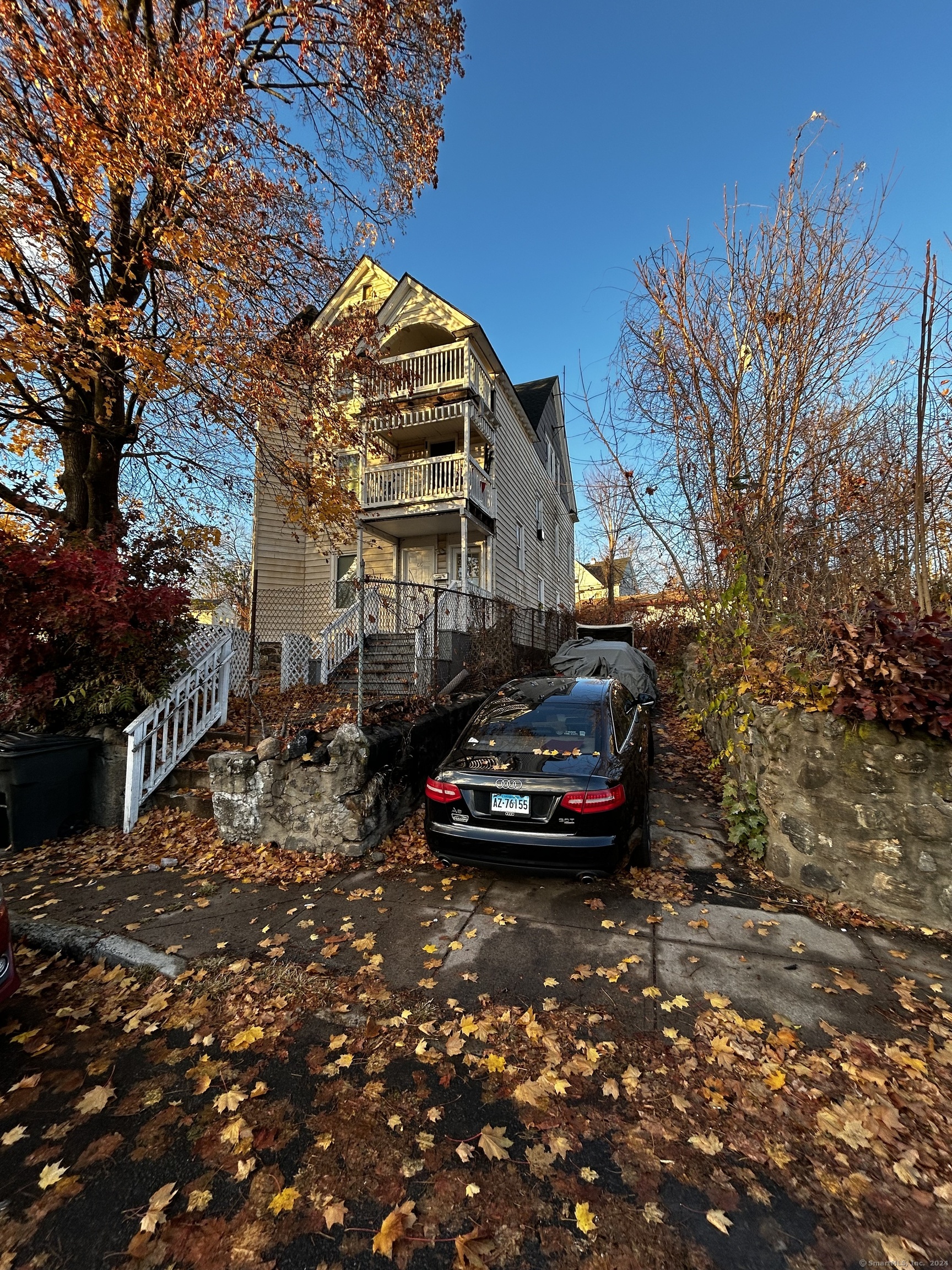 a view of a street with cars