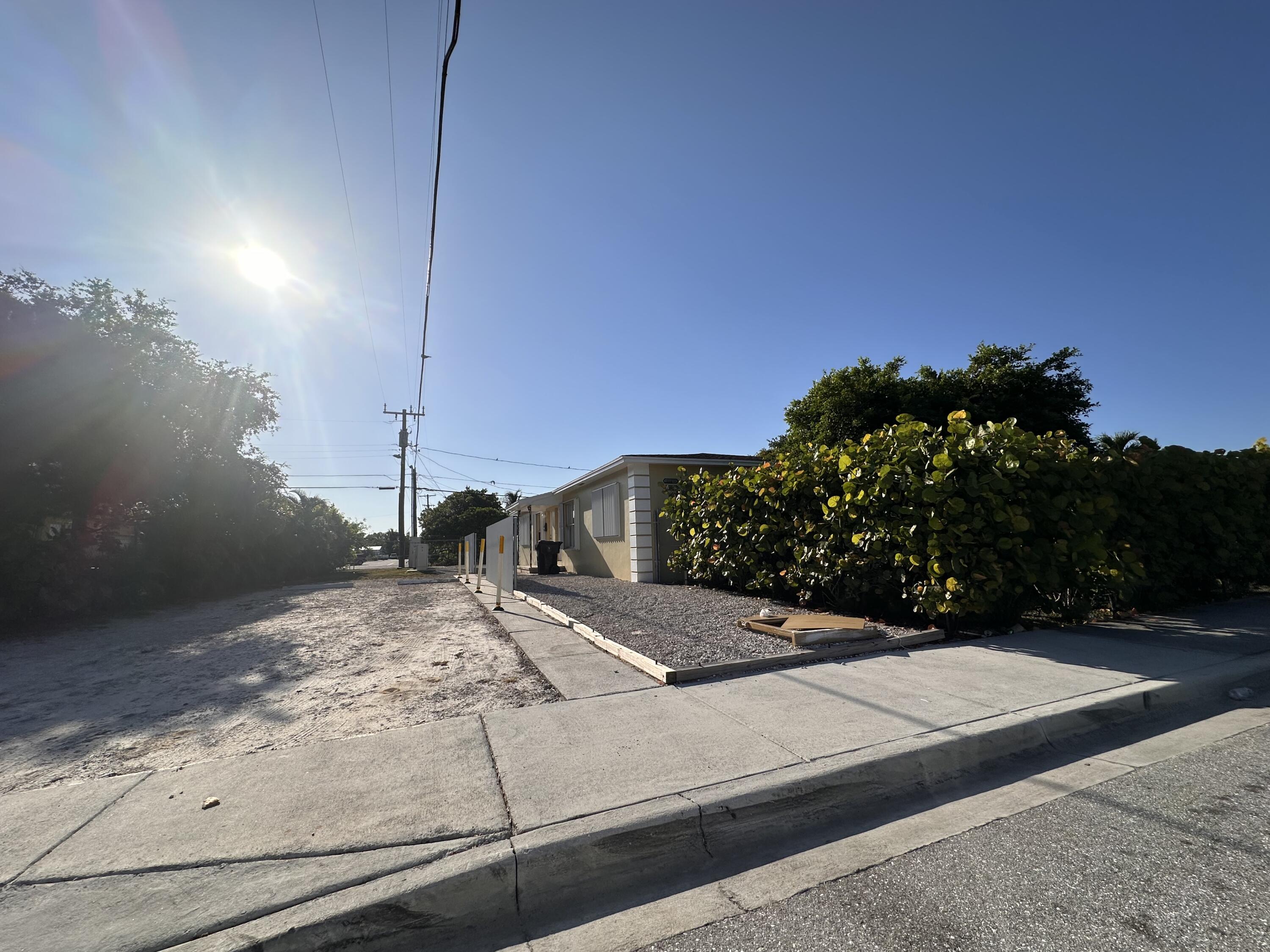 a view of a road from a yard