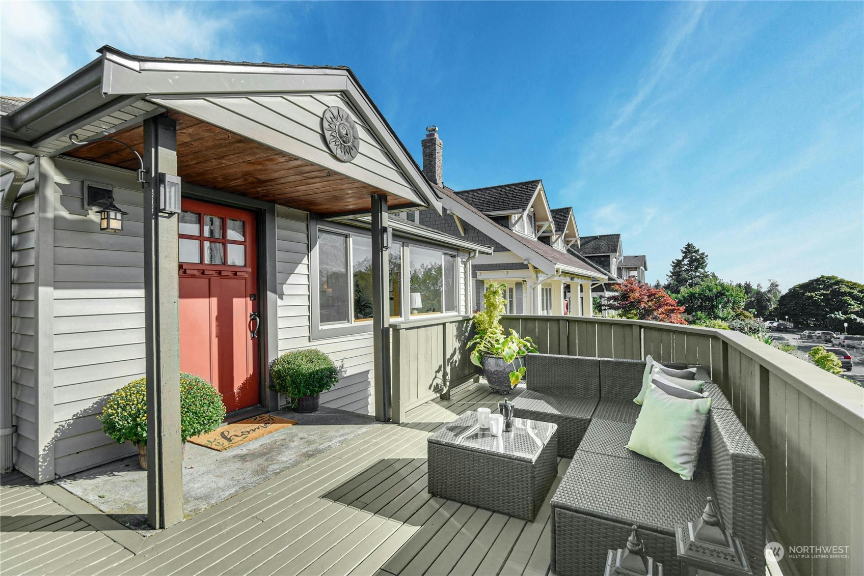 a view of a house with a chairs in patio