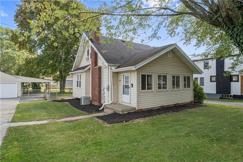 a house view with a garden space