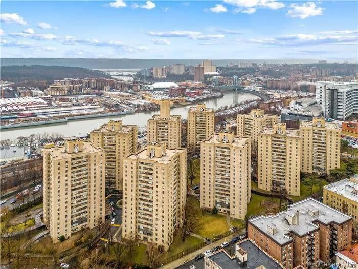 Property's view of city featuring a water view