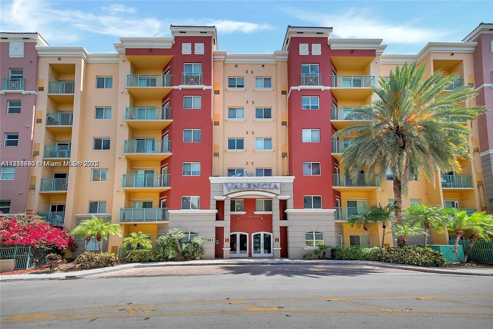 a front view of multi story residential apartment building