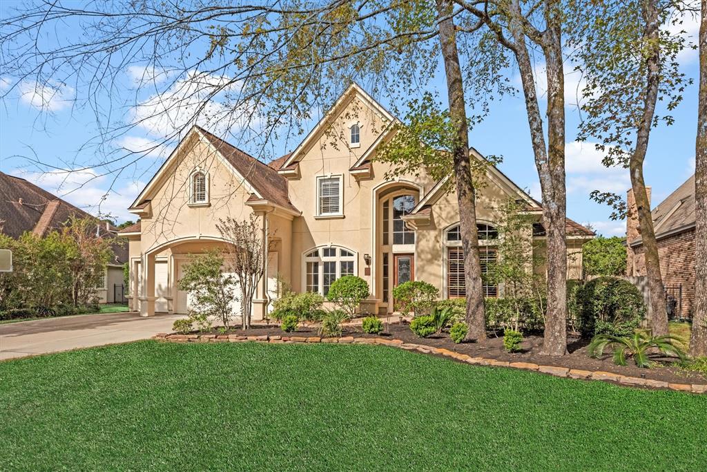 a view of multiple house with a yard