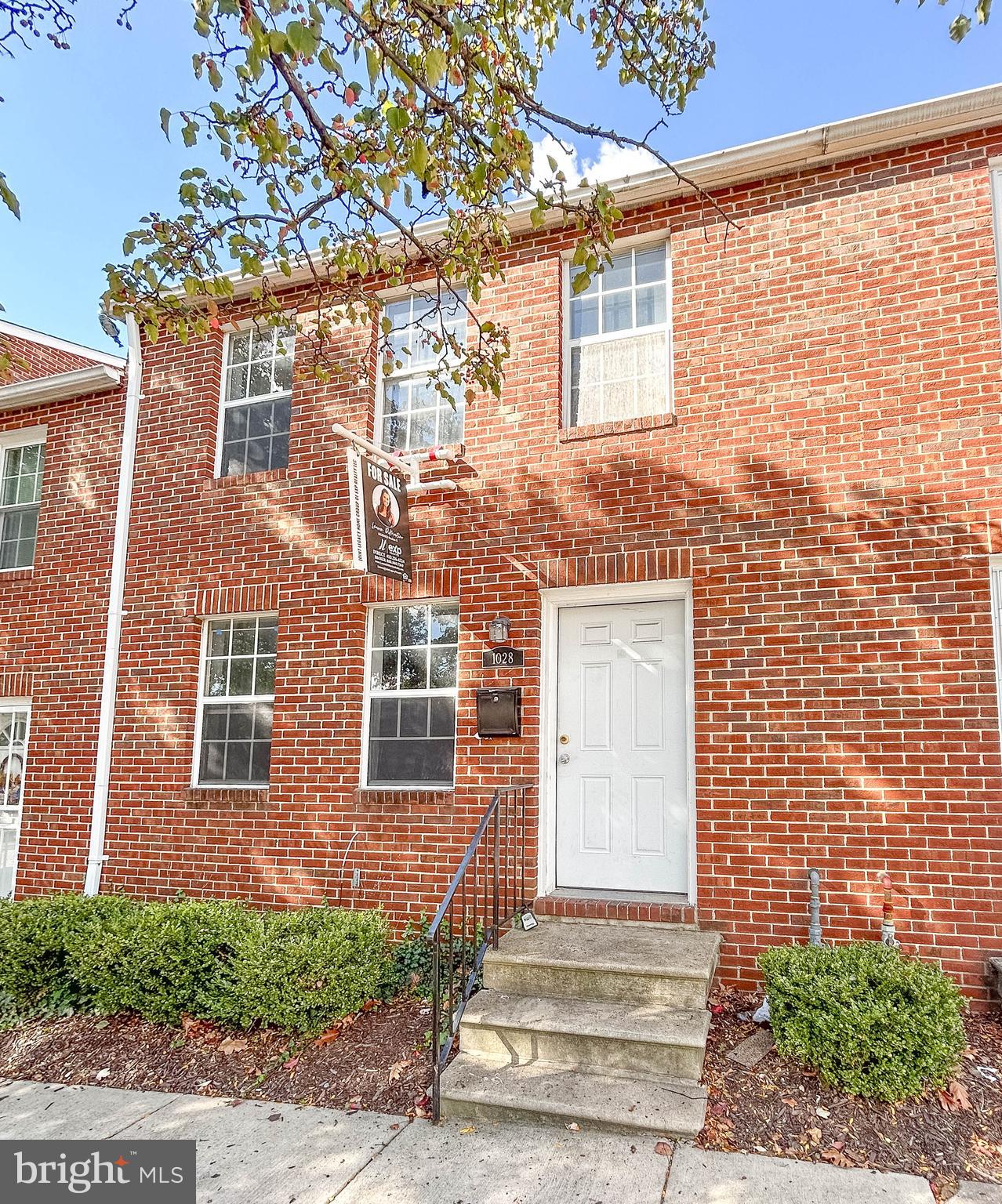 a front view of a house having yard