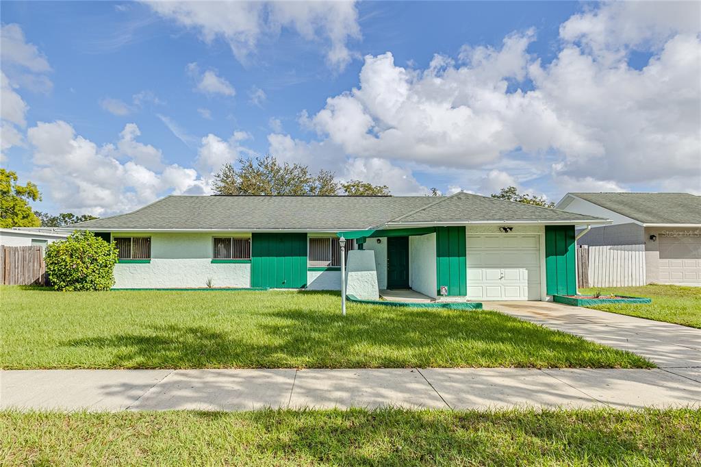 front view of a house and a yard