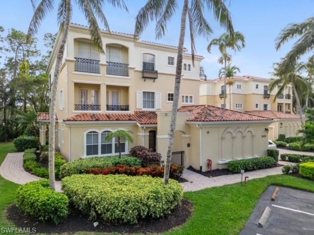 Front of condo with front balcony.