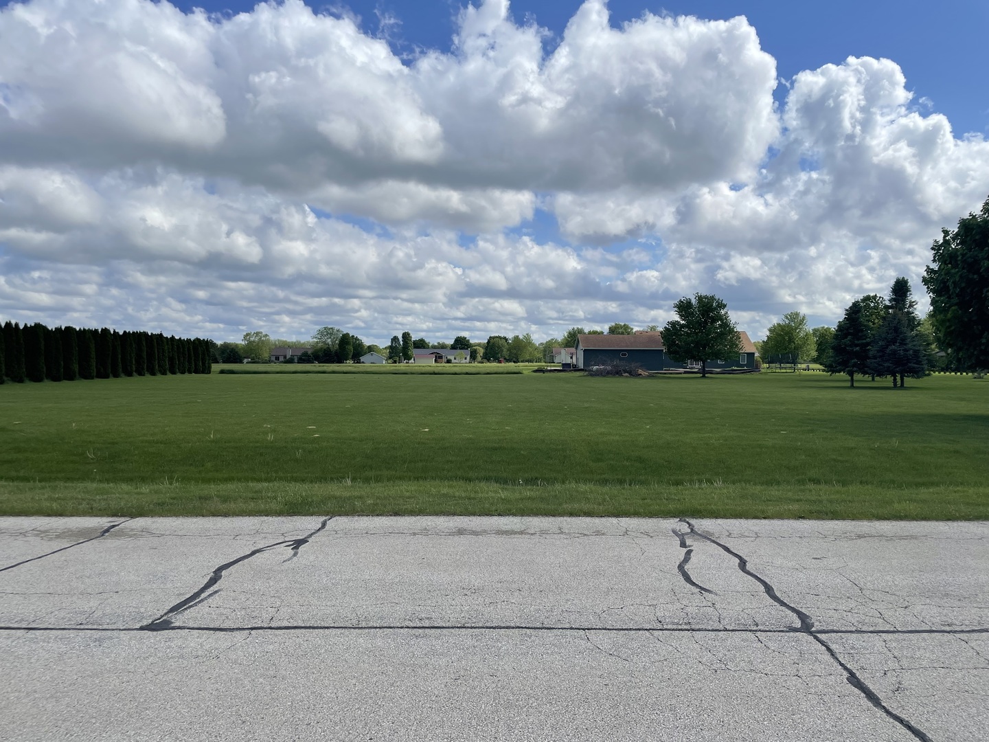 a view of a yard and entertaining space