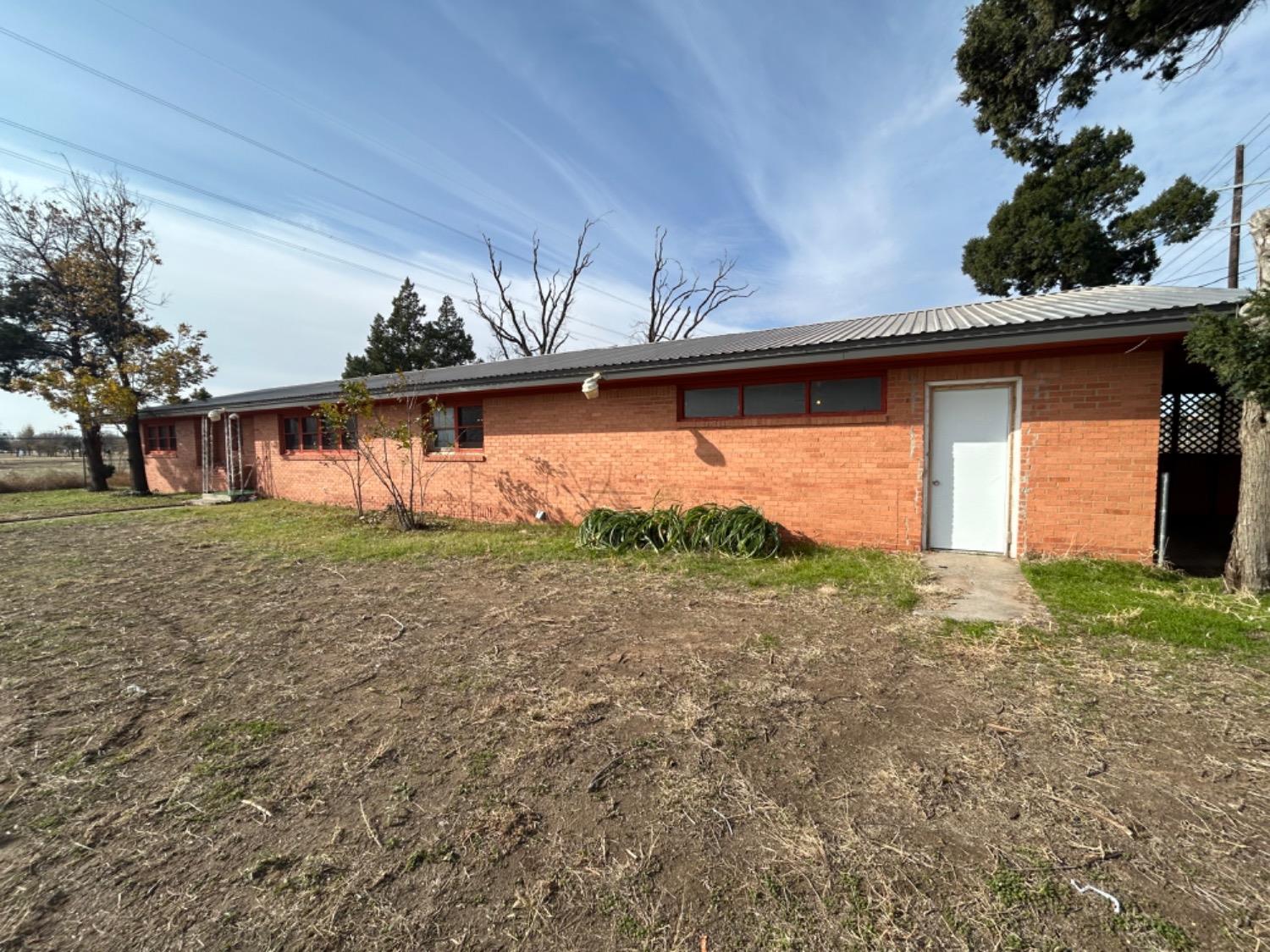 a front view of house with yard