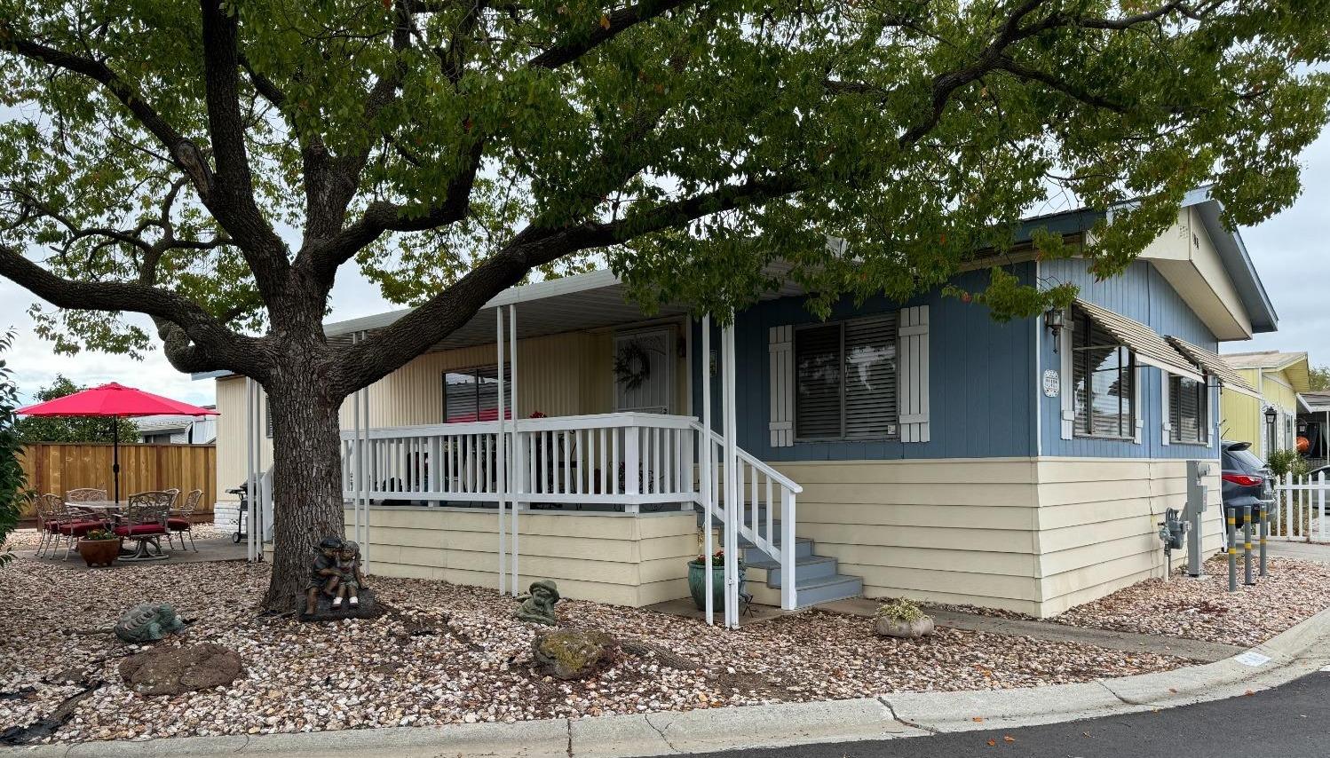 a house with trees in the background