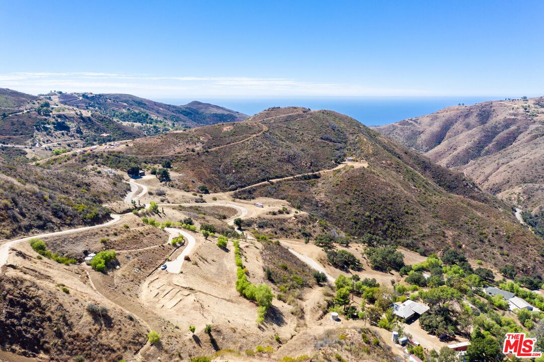 a view of mountains and valleys