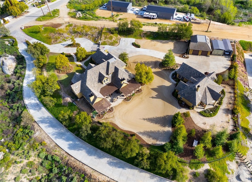 2 Homes, Detached garage and TWO storage buildings.