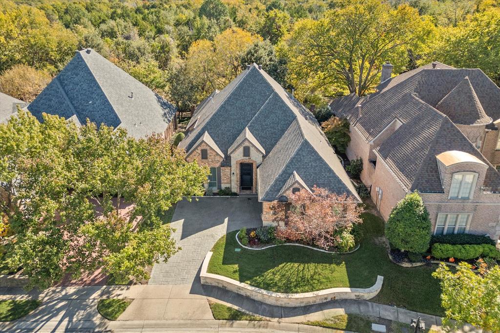 an aerial view of house with yard