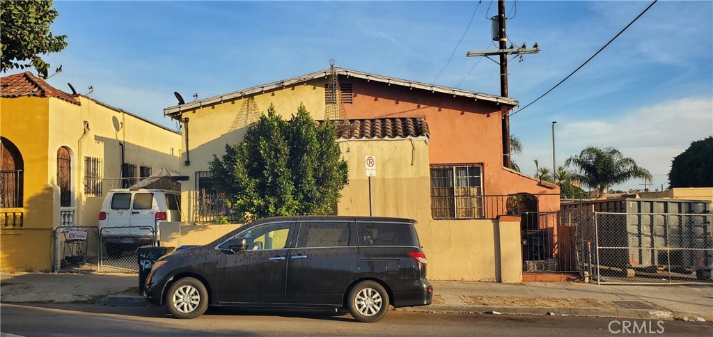 a car parked in front of a house