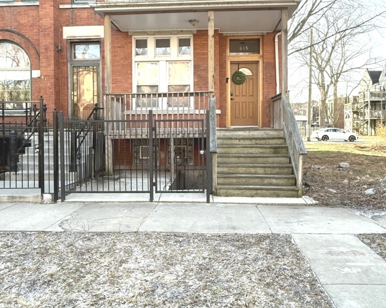 a front view of a house with a outdoor space