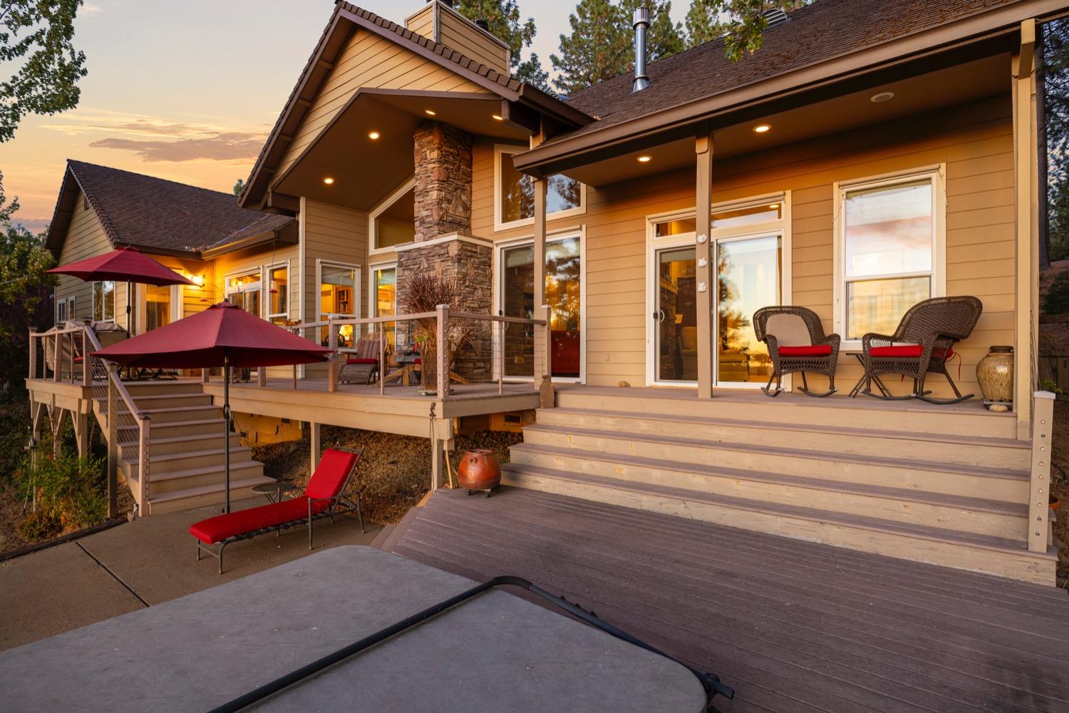 a view of a patio with a table and chairs