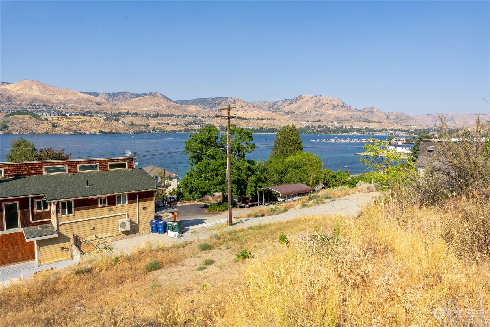 a view of a terrace with a lake view