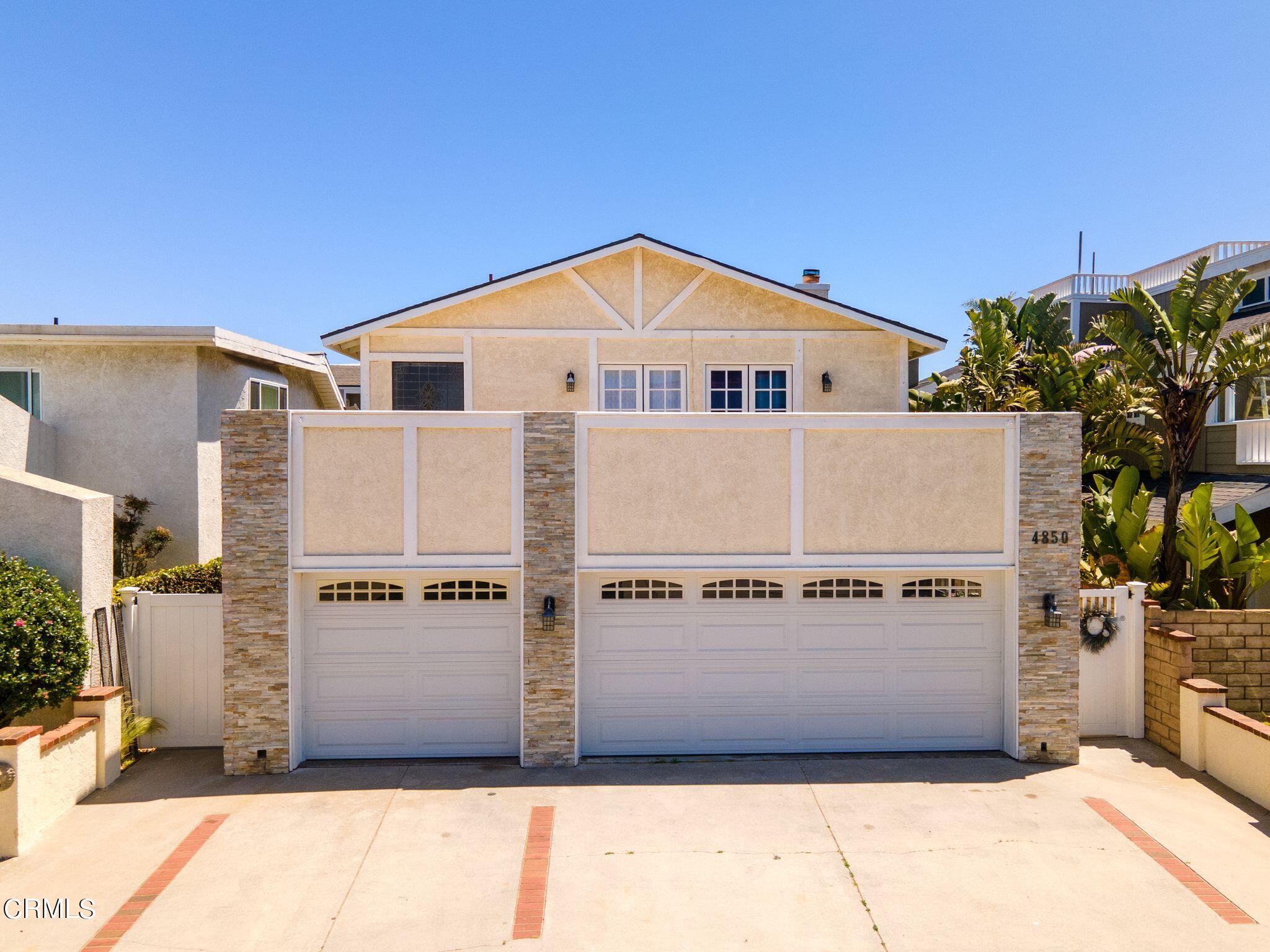 a view of a house with garage