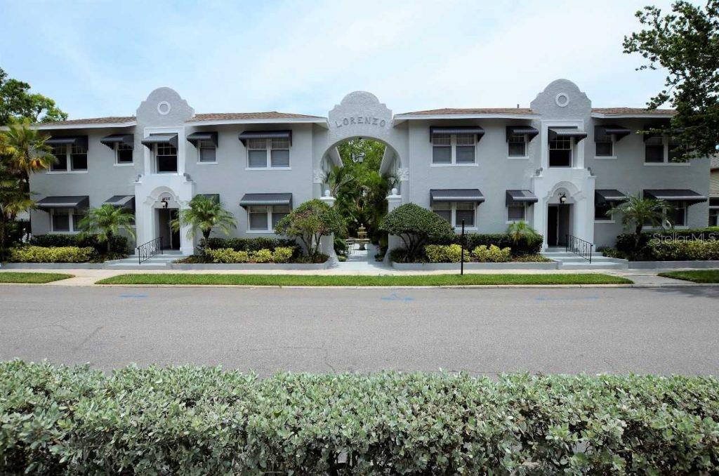 a front view of a house with swimming pool